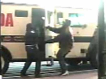 Videos released in armed robbery of armored vehicle at Walmart