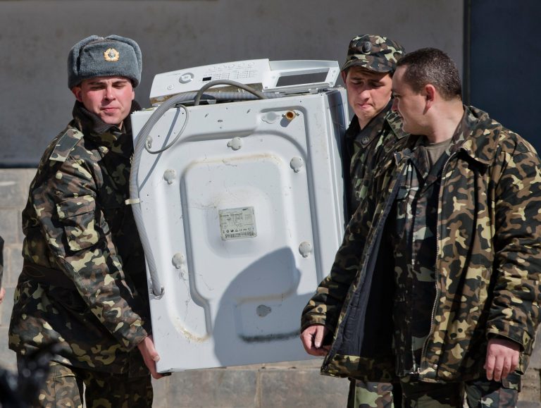 Crimea goes east, Ukraine goes west in 2 new deals