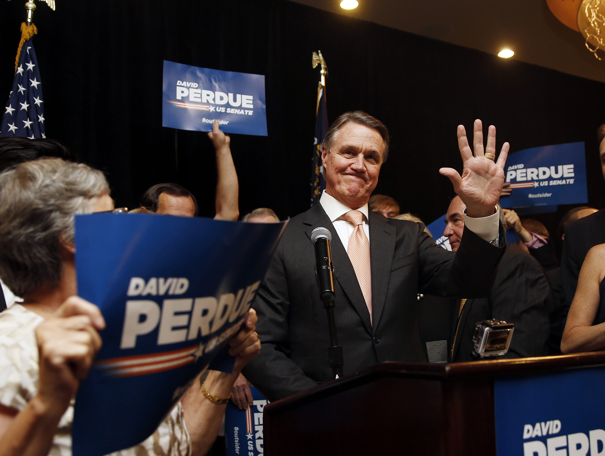 Nunn and Perdue shift to fall battle of outsiders