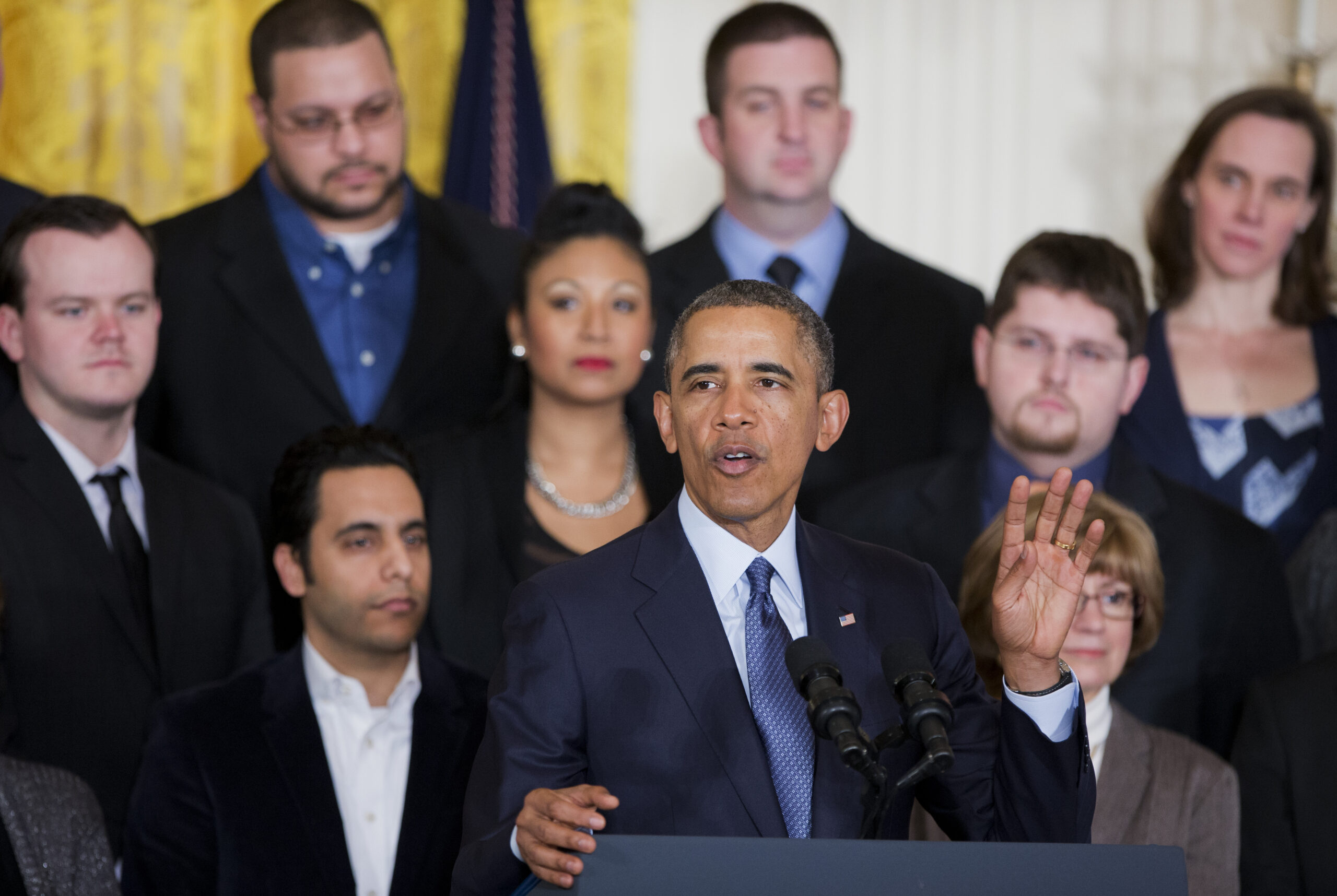 Obama touts overhaul of rules on who gets overtime