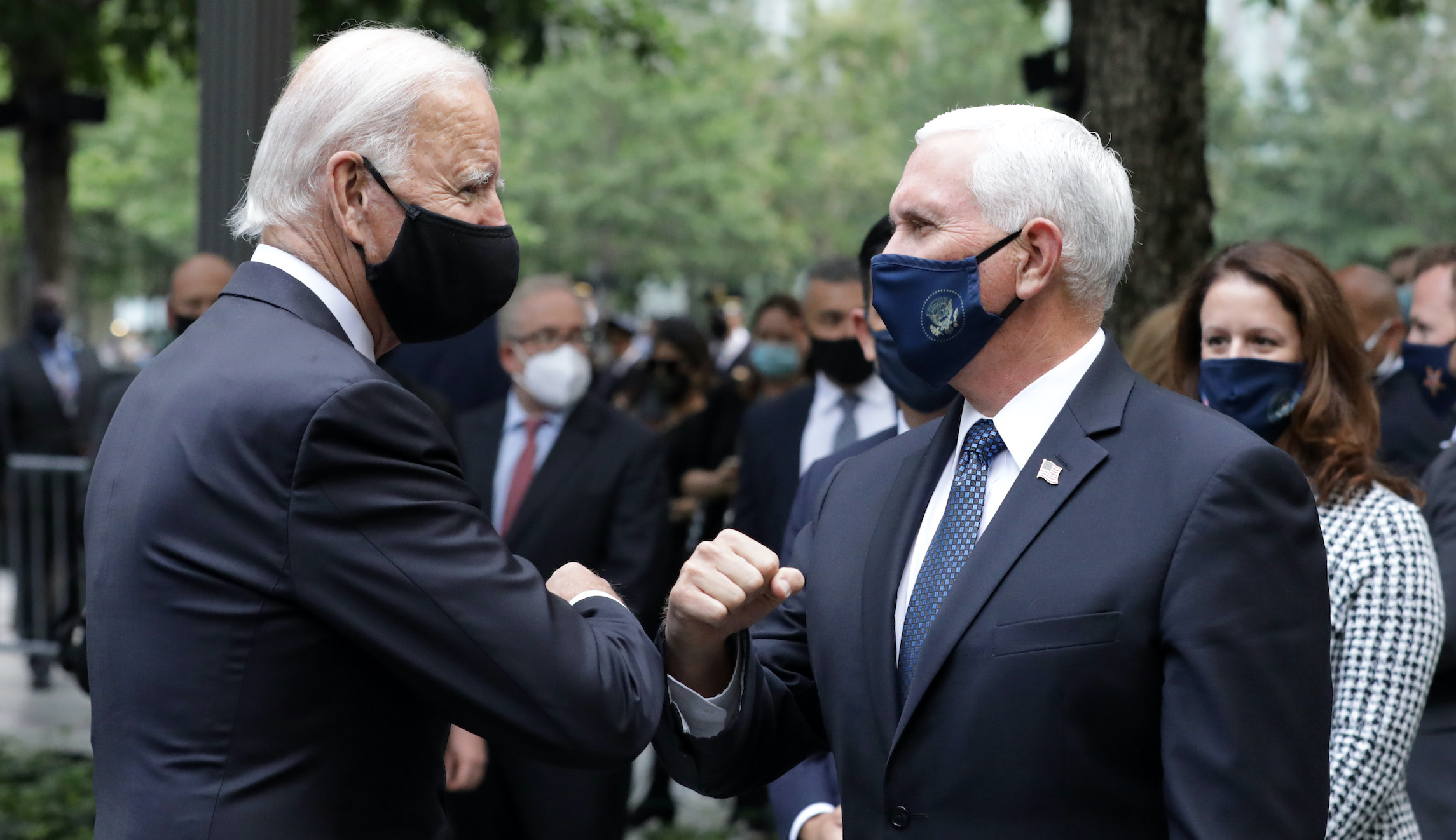 Biden and Pence bump elbows at 9/11 memorial