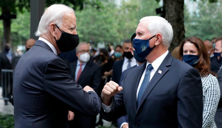 Biden and Pence bump elbows at 9/11 memorial