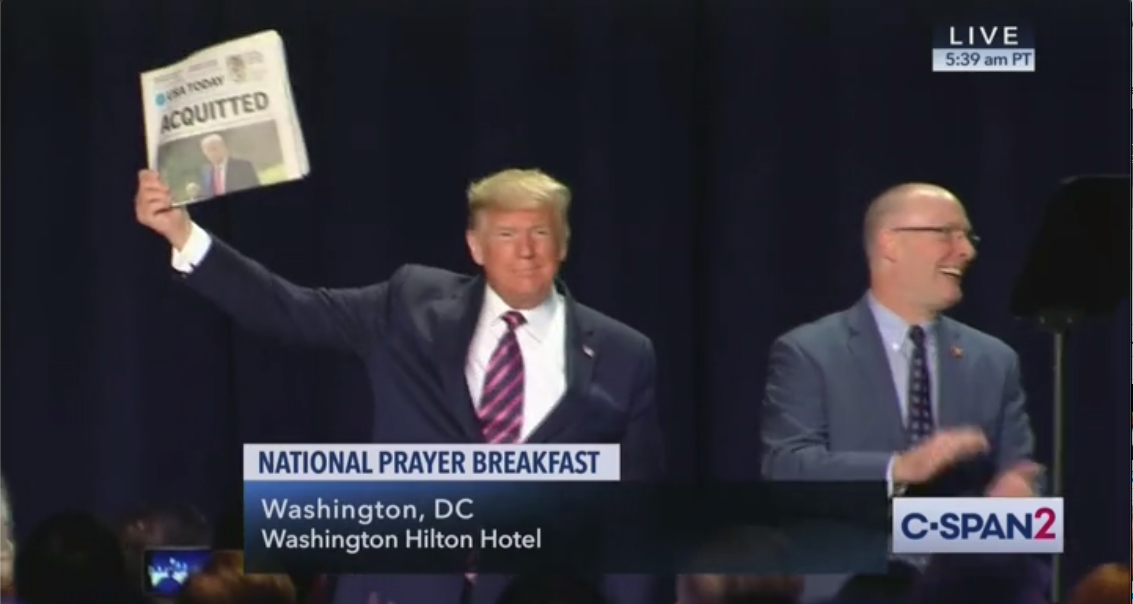 ‘ACQUITTED’: Trump showcases post-impeachment front pages during National Prayer Breakfast