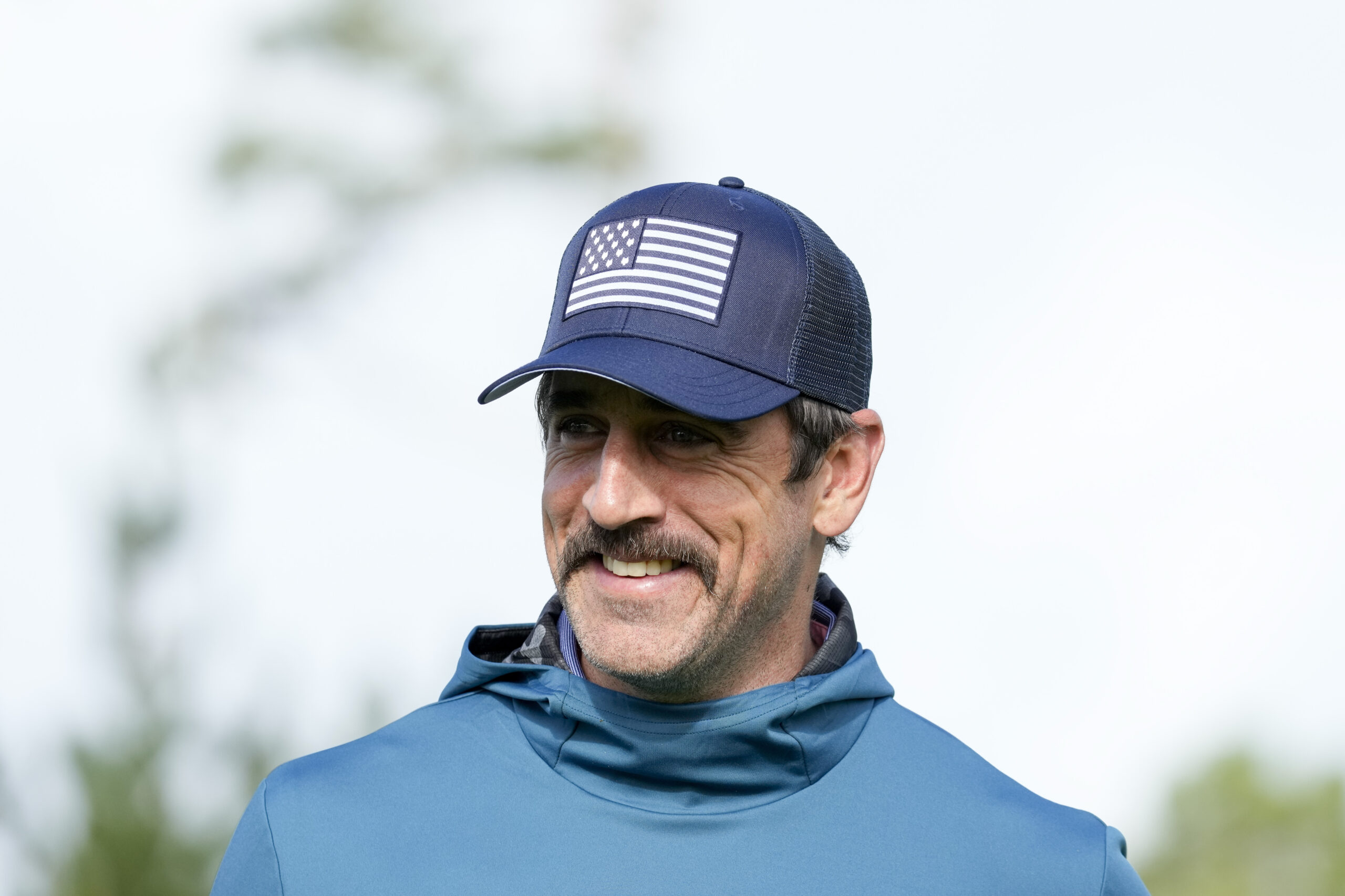 Aaron Rodgers claims drug companies advertise on the news to ‘control the messaging’