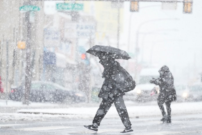 Winter storm snarls holiday travel across Northeast, Great Lakes