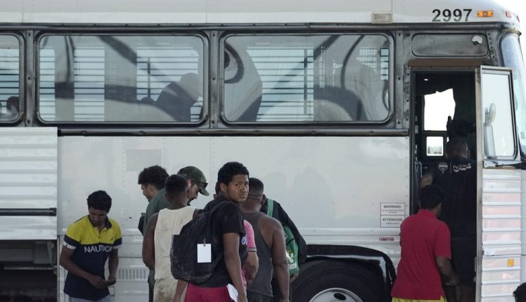 Migrants who entered the U.S. from Mexico are loaded on to a bus at a processing center, Thursday, Sept. 21, 2023, in Eagle Pass, Texas. (AP Photo/Eric Gay)