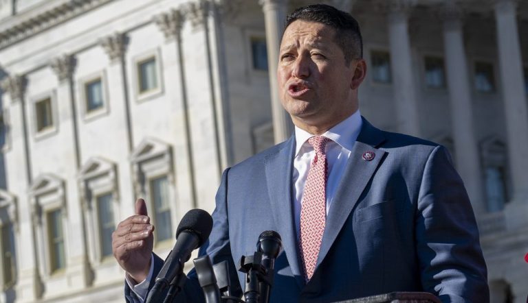 Rep. Tony Gonzales, R-Texas, left, and Rep. Marjorie Taylor Greene, R-Ga., hold a news conference on border security after the deaths of a Georgia couple, Jose Lerma, 67, and Isabel Lerma, 65, near Batesville, Texas, who were killed in a high-speed chase involving migrant smugglers, at the Capitol in Washington, Tuesday, Nov. 14, 2023. (AP Photo/J. Scott Applewhite)