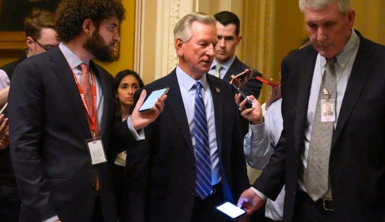 Sen. Tommy Tuberville, R-Ala., speaks with members of the media as he walks, Wednesday, Feb. 28, 2024, at the Capitol in Washington. Earlier Sen. Mitch McConnell announced that he'll step down as Senate Republican leader in November. (AP Photo/Mark Schiefelbein)