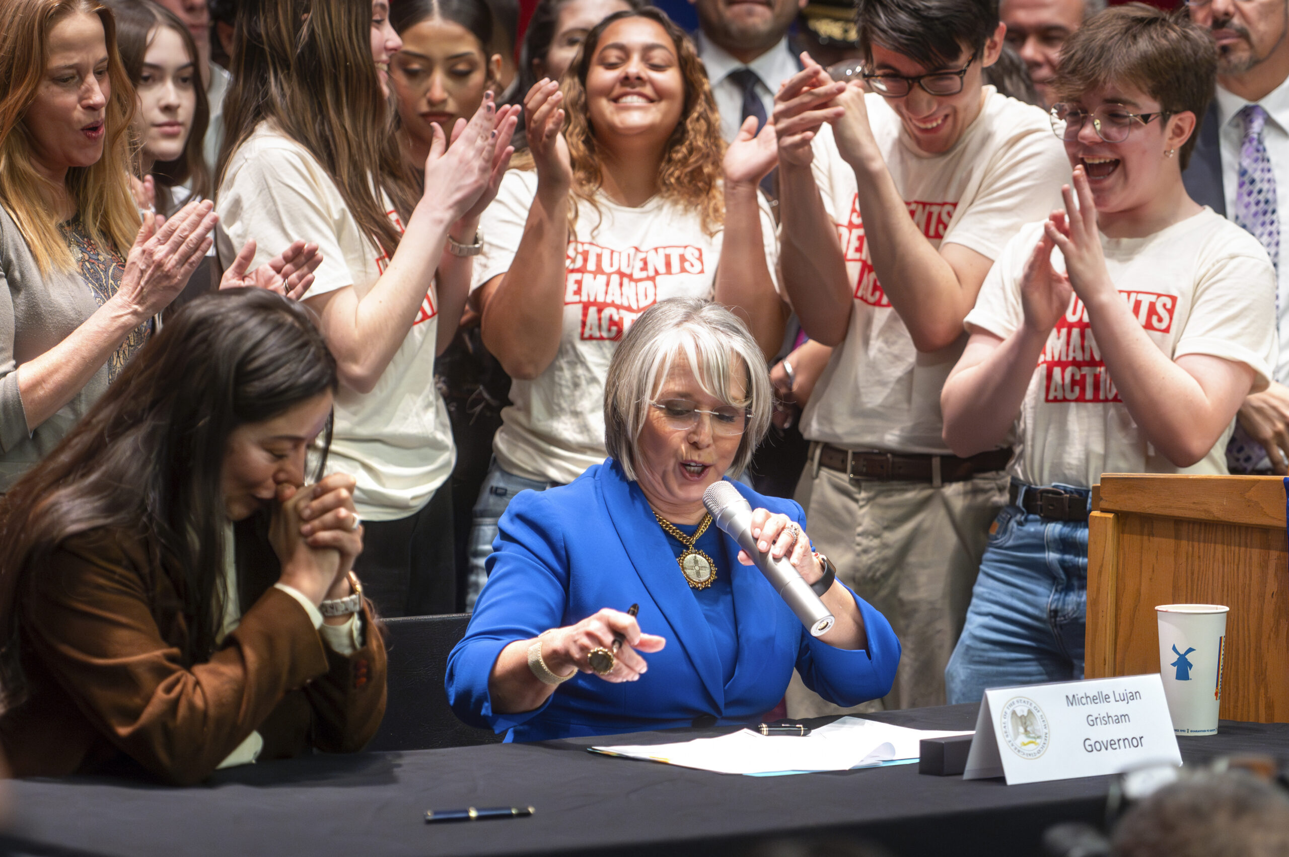 New Mexico governor signs gun control bill months after attempt to suspend right to carry