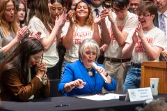 New Mexico governor signs gun control bill months after attempt to suspend right to carry