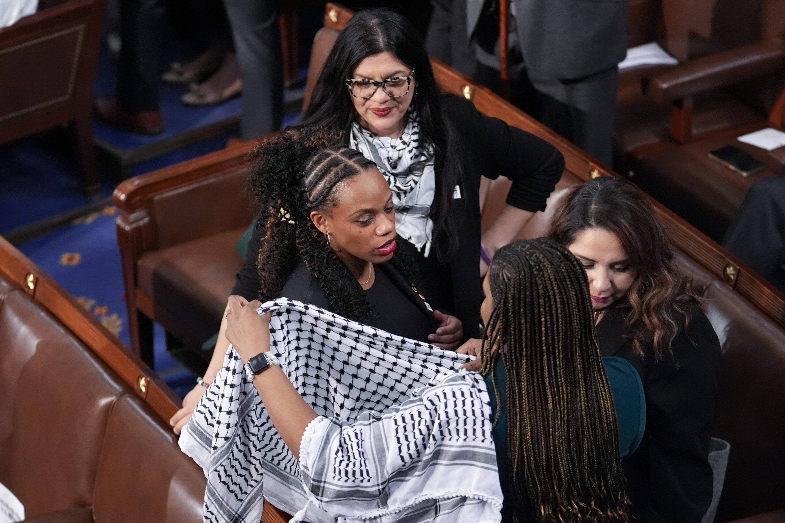 State of the Union 2024: ‘Squad’ members hold up signs calling for ‘lasting ceasefire’ in Gaza