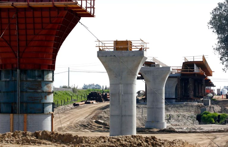 The high speed rail viaduct under construction over the San Joaquin River near Fresno, California, on Oct. 9, 2019. The California High-Speed Rail Authority on Feb. 12, 2020, bumped its overall cost estimate for completing the rail line between San Francisco and Los Angeles to $80.3 billion, blaming inflationary increases and better cost projections for a $1.3 billion boost that still is smaller than in previous years.