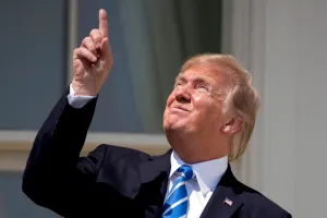 White House celebrates solar eclipse by reposting 2017 photo of Trump without eyewear