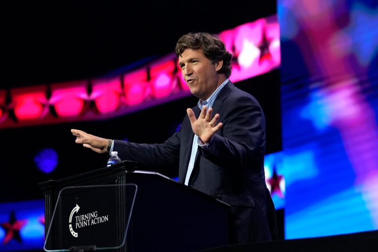 Tucker Carlson contends US is not ‘f***ed up’ in visit to Kid Rock concert