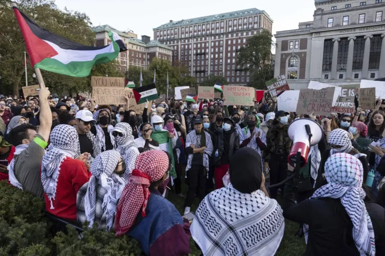 FILE - Pro-Palestinian demonstrators gather for a protest at Columbia University, Thursday, Oct. 12, 2023, in New York. The New York Civil Liberties Union has filed a lawsuit against Columbia University for suspending two student groups that protested Israel's actions in the Gaza war. The lawsuit announced Tuesday, March 12, 2024, accuses Columbia of violating its own rules by suspending the two groups, Students for Justice in Palestine and Jewish Voice for Peace. (AP Photo/Yuki Iwamura, File)