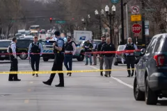 Chicago police officer shot dead and has car taken during commute home: Officials