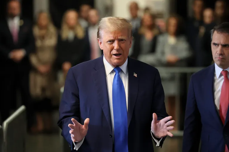 Former president Donald Trump speaks upon arriving at Manhattan criminal court, Monday, April 22, 2024, in New York. Opening statements in Donald Trump's historic hush money trial are set to begin. Trump is accused of falsifying internal business records as part of an alleged scheme to bury stories he thought might hurt his presidential campaign in 2016. (AP Photo/Yuki Iwamura, Pool)
