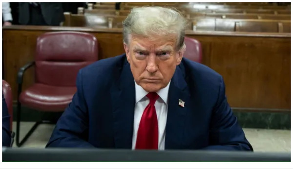 Trump decries ‘persecution’ as he walks into historic trial