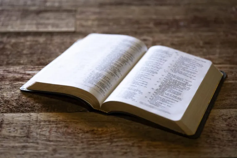 Photograph of a Bible on a retro wood background
