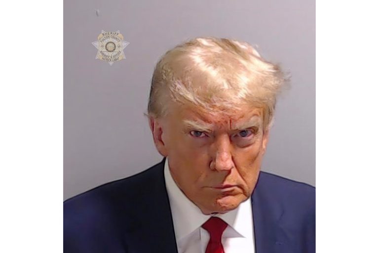 Trump invites ‘Mugshot’ NFT buyers to Mar-a-Lago with promises of trading cards and arraigned-suit shreds