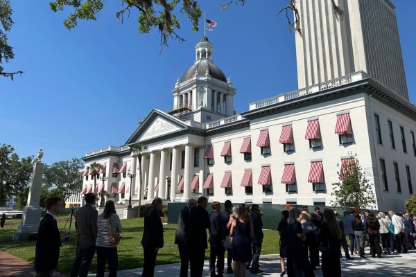 Report praises tax relief, continued reduction of tax-supported debt