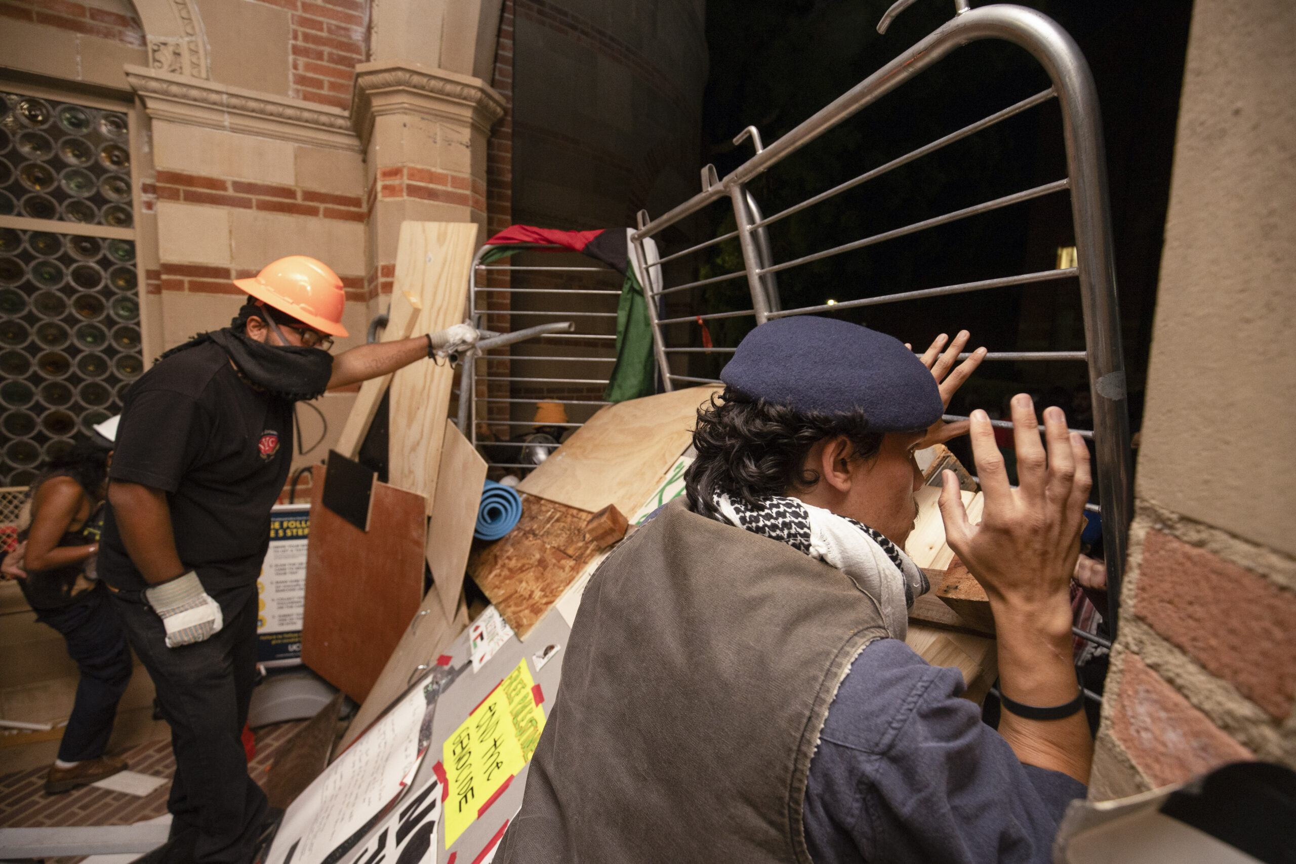 UCLA protesters turn encampment into fortress as large police force gathers
