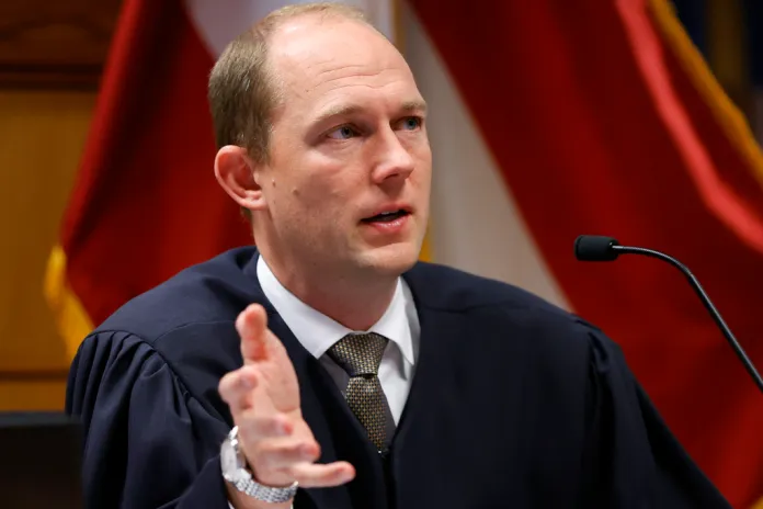 Fulton County Superior Judge Scott McAfee presides in court, March 1, 2024, in Atlanta. A Georgia appeals court has agreed to review a lower court ruling allowing Fani Willis to continue to prosecute the election interference case she brought against Donald Trump.  (AP Photo/Alex Slitz, Pool)