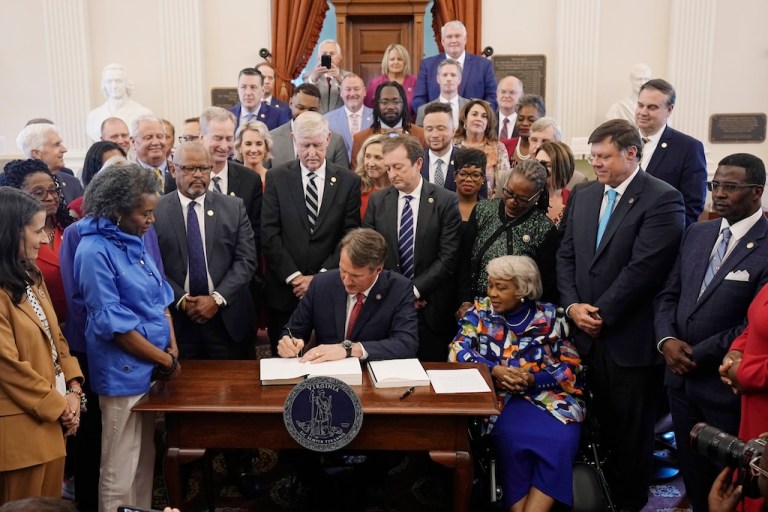 Virginia averts shutdown after Youngkin signs budget into law