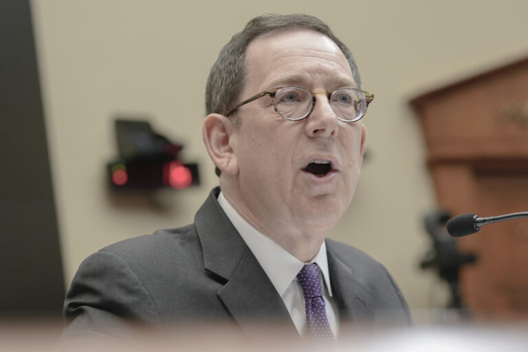 Publicly defiant, elite universities privately line up to hire lobbyists close to Trump