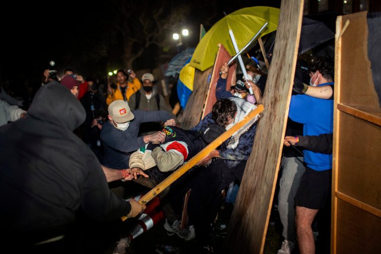 Police make first arrest in UCLA fight between protester groups