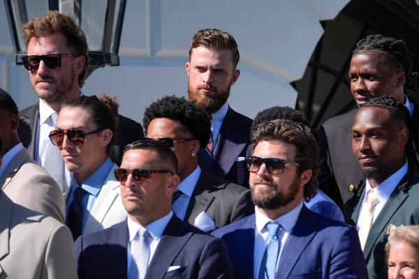 Chiefs kicker Harrison Butker puts politics aside to join Biden at White House