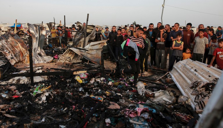 Israeli airstrike kills dozens in Rafah tent camp, authorities say