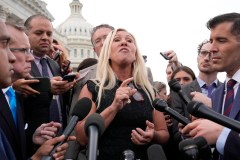 Trump House allies call for government shutdown while Johnson scrambles for a new deal