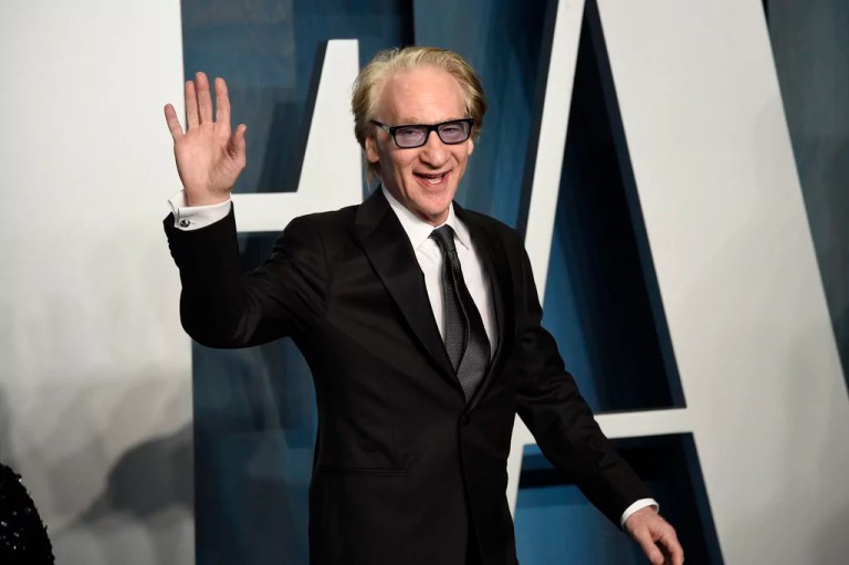 Bill Maher arrives at the Vanity Fair Oscar Party in Beverly Hills, California, on March 27, 2022. Maher has delayed returning to his HBO talk show during the ongoing strike by writers and actors, a decision following similar pauses in the past few days by “The Drew Barrymore Show,” “The Talk” and “The Jennifer Hudson Show.”