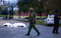 Police officers and priest among 15 killed after attacks on places of worship in southern Russia