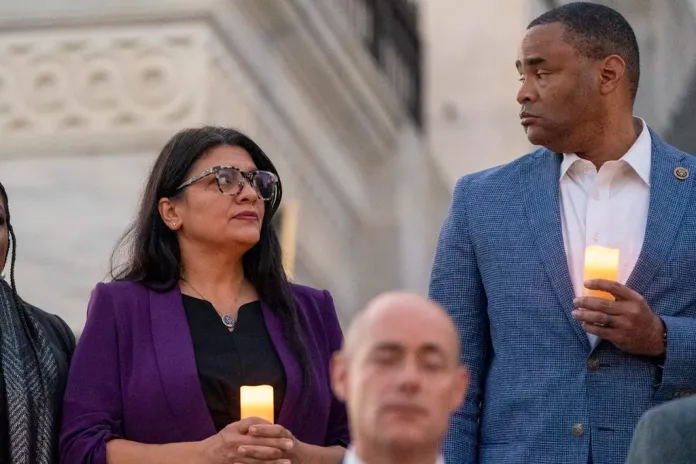 Squad member Rashida stands with Marc Veasey, on the steps of the U.S. House of Representatives. On Friday, Veasey became the first Congressional Black Caucus Member to ask Biden step aside. (AP Photo/Alex Brandon, File)
