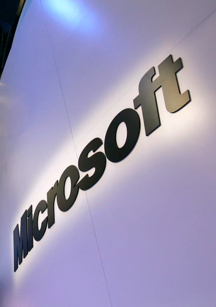 FILE - In this Jan. 10, 2009 file photo, the Microsoft logo is seen at the company's exhibit at the Consumer Electronics Show in Las Vegas. Microsoft is giving a select group of technology-savvy testers an early peek at Office 2010, but it's still keeping Web-based versions of Word, Excel, and its other go-to programs under wraps. (AP Photo/Paul Sakuma, file)