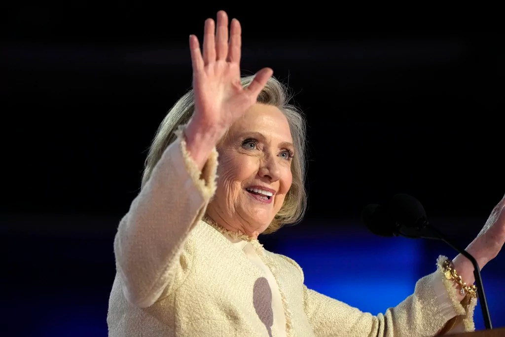 Hillary Clinton lets ‘lock him up’ chants echo around DNC