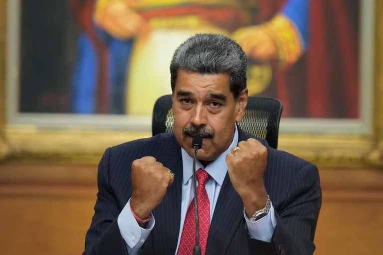 President Nicolas Maduro gestures during a news conference at Miraflores presidential palace in Caracas, Venezuela, Wednesday, July 31, 2024, three days after his disputed reelection.