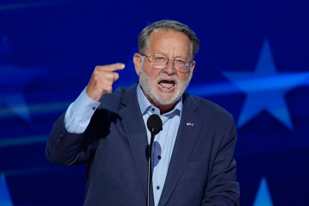 Gary Peters brings retired Teamsters onstage to ‘USA’ chants