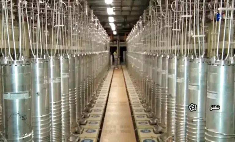 In this image made from April 17, 2021, video released by the Islamic Republic Iran Broadcasting, IRIB, state-run TV, various centrifuge machines line the hall damaged on Sunday, April 11, 2021, at the Natanz Uranium Enrichment Facility, some 200 miles (322 km) south of the capital Tehran, Iran. Iran named a suspect Saturday in the attack on its Natanz nuclear facility that damaged centrifuges there, as Reza Karimi and said he had fled the country 