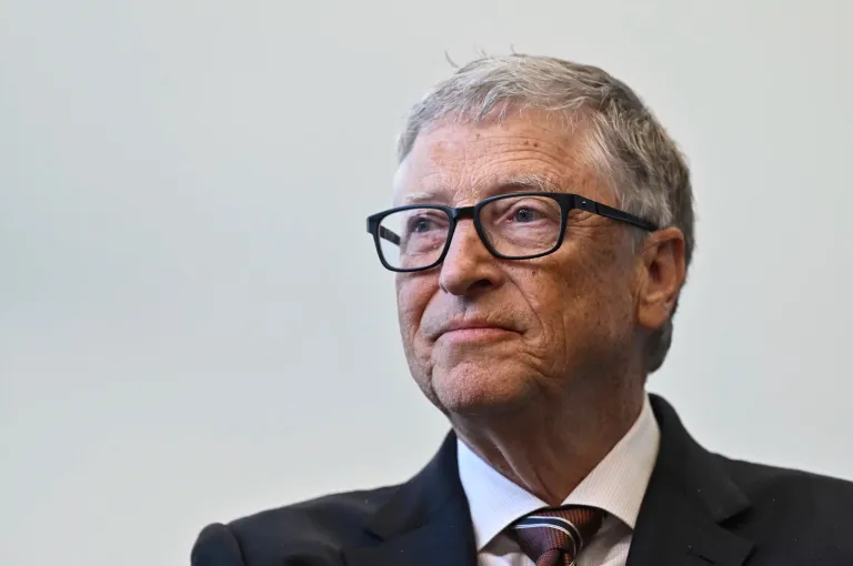 Bill Gates reacts during a visit with Britain's Prime Minister Rishi Sunak at the Imperial College University, in central London, Feb. 15, 2023.