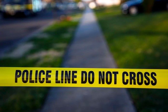 Police tape cordons off the scene of a crime in Levittown, Pennsylvania, Saturday, March 16, 2024.