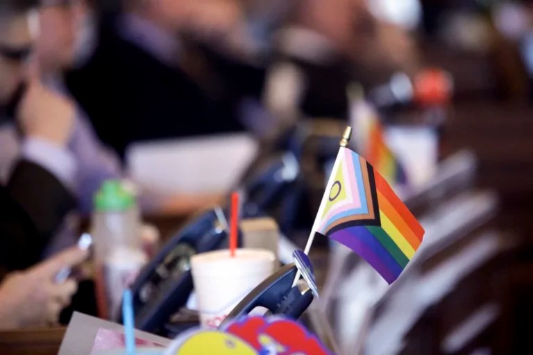 A flag supporting LGBT rights decorates a desk on the Democratic side of the Kansas House of Representatives during a debate, March 28, 2023, at the Statehouse in Topeka, Kansas.