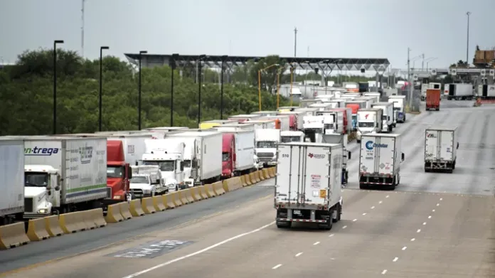 Commercial trucks travel across the World Trade International Bridge in Laredo, Texas, which accounts for more than a third of U.S. trade with Mexico. (Callaghan O’Hare/Bloomberg via Getty)