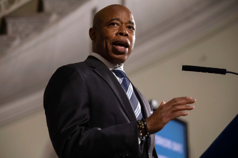 Adams uses landmark housing proposal to fight criticism of staying in office