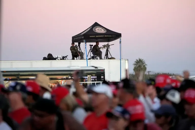 Law enforcement snipers look over the scene as former President Donald Trump, Republican presidential nominee, speaks at a campaign rally at the Calhoun Ranch, Saturday, Oct. 12, 2024, in Coachella, California.