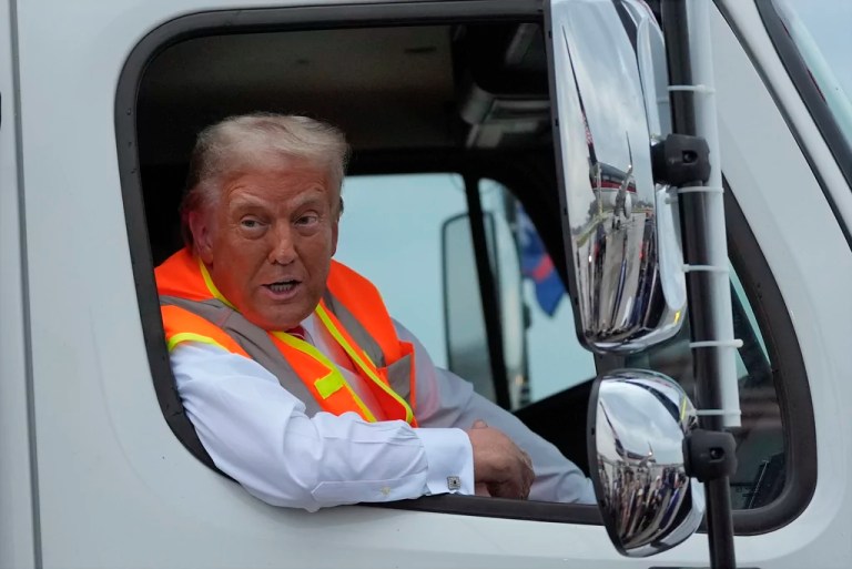 Trump rides in ‘garbage’ truck in ‘honor of Kamala and Joe Biden’
