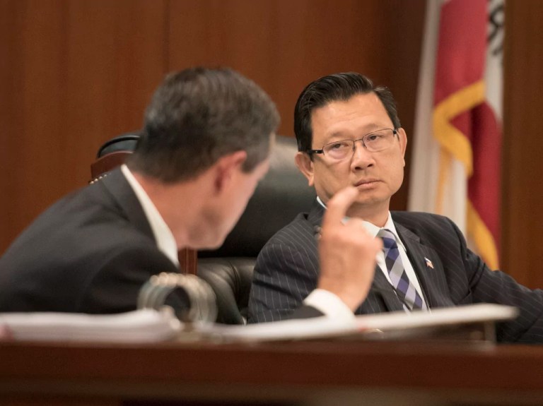Orange County supervisor accused of taking bribes, pleads guilty to conspiracy, and resigns