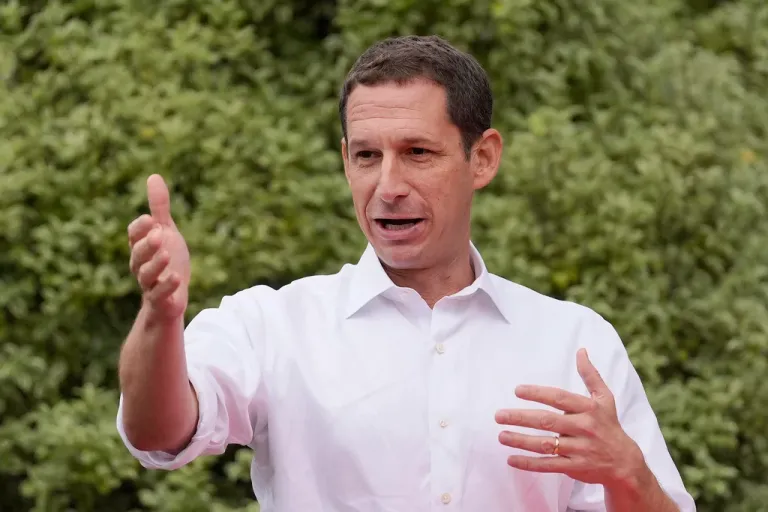 San Francisco mayoral candidate Daniel Lurie gestures while speaking.